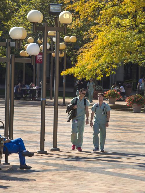 Medical students walking on the RBHS campus