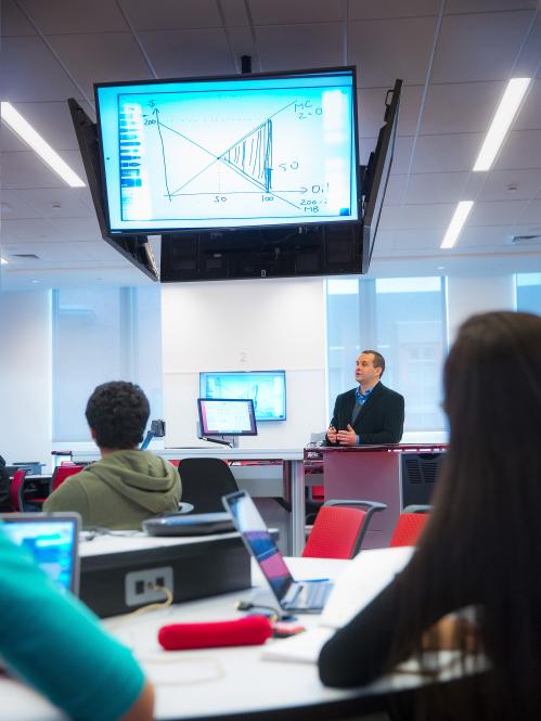 Economics class held in smart classroom in the new Academic building