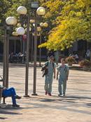 Medical students walking on the RBHS campus