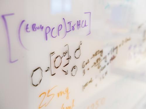 scientific formula on whiteboard