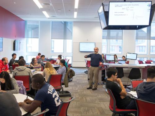 Mathematics lecturer Dr. Michael Weingart in class