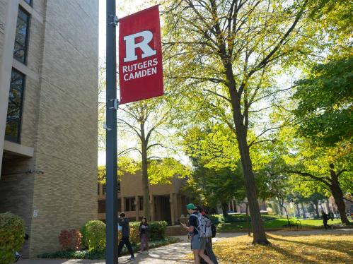 student walking on the Camden Campus