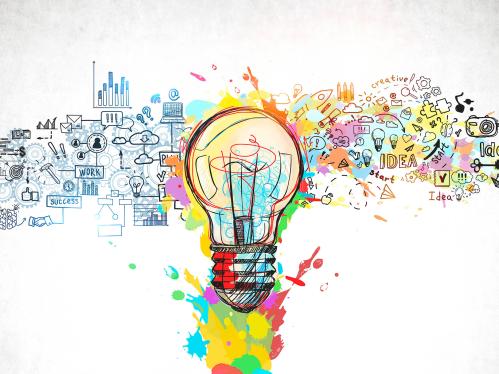drawing of a lightbulb with colorful idea icons