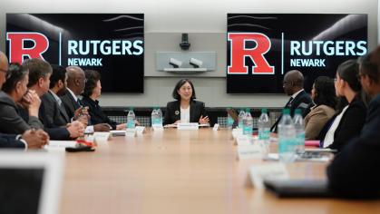 Ambassador Katherine Tai addressing a group of Rutgers Business School students and administrators at a table